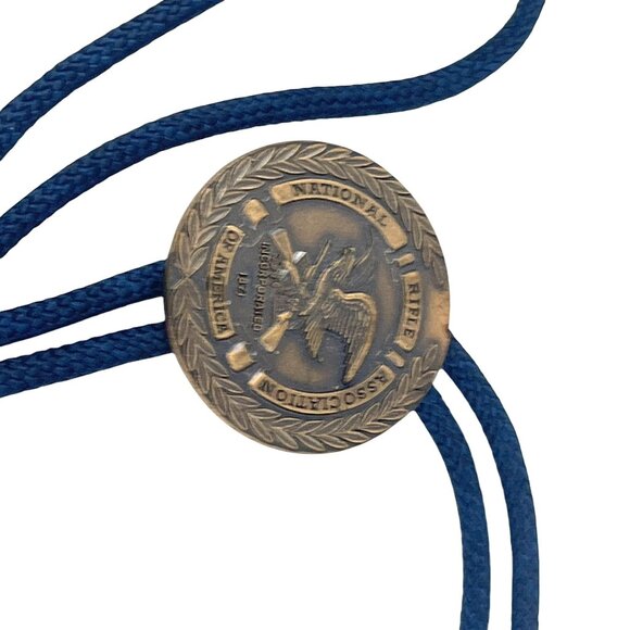 NRA National Rifle Association Brass Medallion Bolo Tie Blue Cord & Gold Tips - Picture 1 of 8